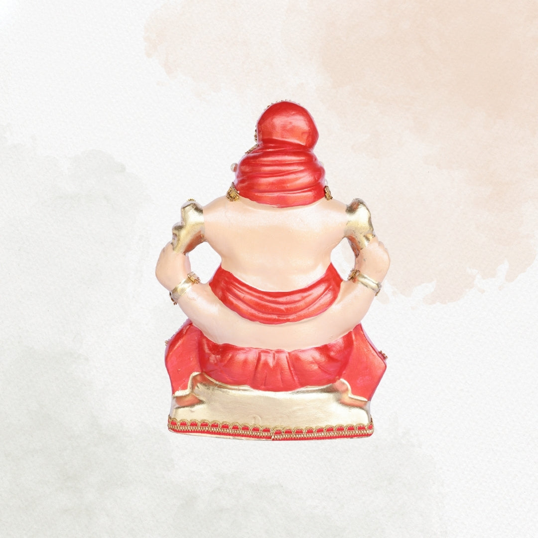 13 Inch – Traditional Sitting Ganesha Idol in Red Shadu Mitti with Golden Crown & Pearl Stone Adornments