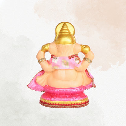 13 Inch – Divine Seated Ganesha Idol in Pink Silk Attire Shadu Mitti Clay Murti with Gold Crown & Peacock Motif Stone Work