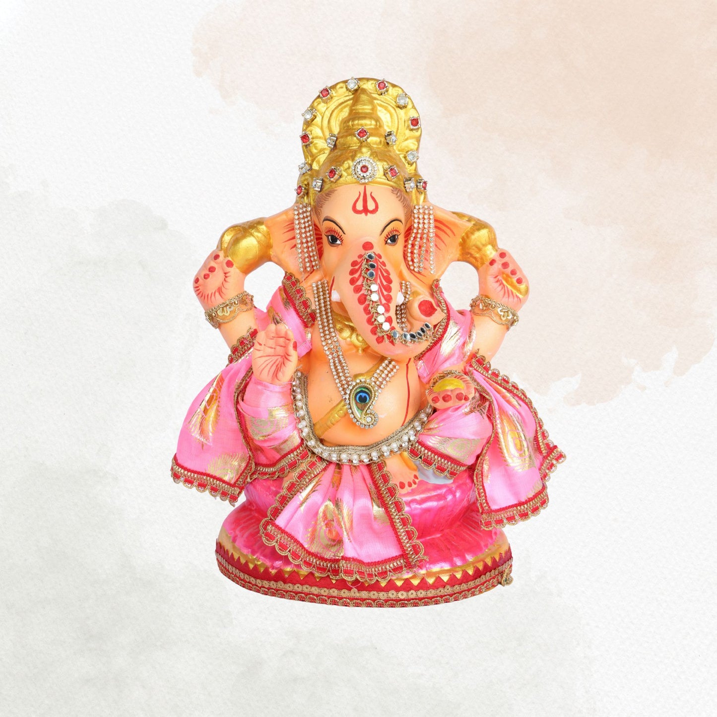 13 Inch – Divine Seated Ganesha Idol in Pink Silk Attire Shadu Mitti Clay Murti with Gold Crown & Peacock Motif Stone Work