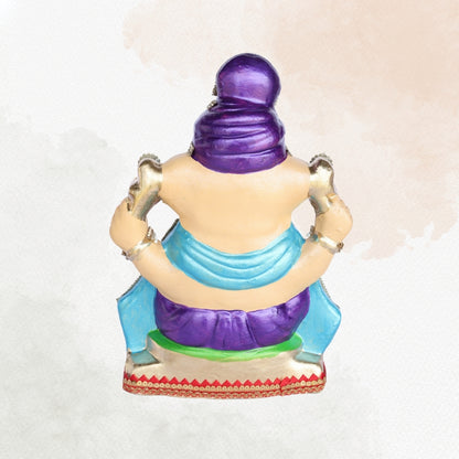 13 Inch – Royal Seated Ganesha Idol in Purple Attire Shadu Mitti Clay Murti with Blue Shawl & Pearl Stone Crown