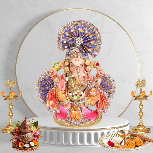 13 Inch – Ganesha Idol with Royal Blue Crown, Orange Attire & Decorative Fan-Style Pagdi
