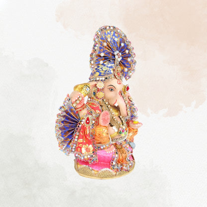 13 Inch – Ganesha Idol with Royal Blue Crown, Orange Attire & Decorative Fan-Style Pagdi
