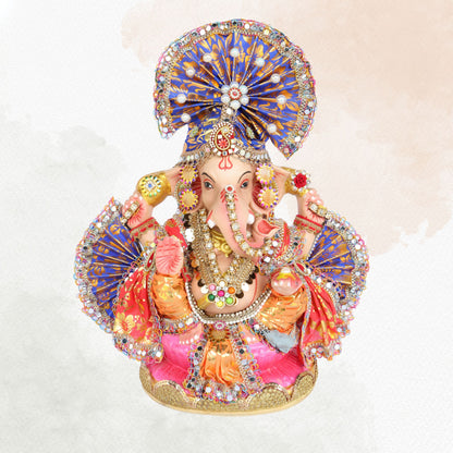13 Inch – Ganesha Idol with Royal Blue Crown, Orange Attire & Decorative Fan-Style Pagdi