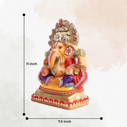 11 Inch – Ganesha Idol in Royal Purple Dhoti with Golden Crown | Shadu Mitti Clay Murti with Pearl Motif & Red Drapes