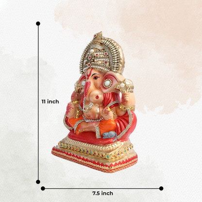 11 Inch – Royal Seated Ganesha Idol in Orange Attire | Shadu Mitti Clay Murti with Beaded Crown & Pearl Stone Work